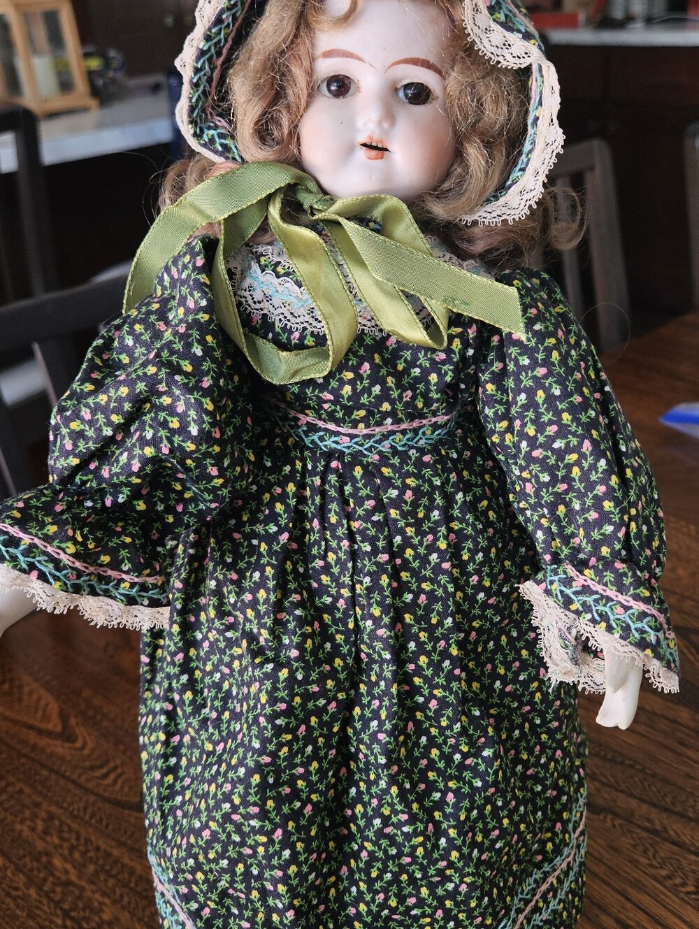 Antique(1890-1920)Bisque Head Doll from Germany. Stand Included.